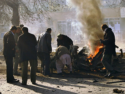 Officials inspect the site of the suicide car bomb attack in Kabul (Photo: Reuters)