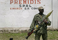 A rebel soldier, loyal to General Laurent Nkunda, stands guard in Kiwanja(Photo: Reuters)