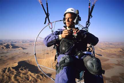 Steinmetz in a harness with his camera(Photo: courtesey of <a href="http://www.georgesteinmetz.com" target="_blank">George Steinmetz</a>)