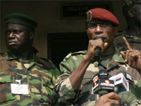 Captain Moussa Dadis Camara (R) speaks during a meeting in Conakry.(Photo: Reuters)