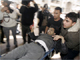 A wounded Palestinian man is carried to hospital.(Photo: Reuters)