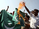 College students shout and burn Pakistan's national flags during a protest against Mumbai's recent attacks, in the western Indian city of Ahmedabad December 5, 2008. Several attackers may have survived the three-day siege of Mumbai that killed 171 people last week, analysts said. REUTERS/Amit Dave (Photo: Reuters)