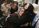 Relatives of Tawfiq Qanan, who was killed in an Israeli air strike, mourn during his funeral in Gaza (Photo: Reuters)