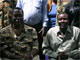 LRA leader Joseph Kony (R) meets with local Acholi chief David Achana on 30 November 2008. The military has not provided details of Kony's fate following Sunday's attack.(Photo: Reuters)