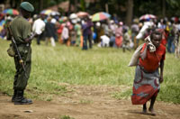 A DRCongo woman carries relief food(Credit: Reuters)