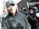 Bernard Madoff walks back to his apartment in New York, 17 December (Credit: Reuters)