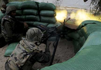 A Sri Lankan army soldier in Paranthan, which was captured on 23 December(Photo: Reuters)