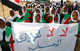 Sudanese children wearing the national colours demonstrate against the ICC outside the UN offices(Photo: Reuters)