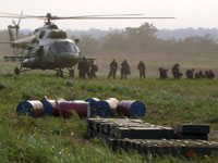 Uganda army special forces alight from an assault helicopter during an operation against the Lord's Resistance Army (LRA) camp in Democratic Republic of Congo in December 2008 (Photo: Reuters)
