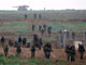 Israeli soldiers crossing the Gaza border back to Israel early on Sunday(Photo: Reuters)