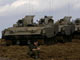 Israeli tanks lined up just outside the central Gaza Strip(Credit: Reuters)