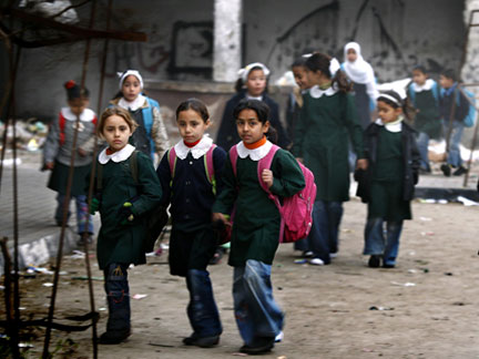 Palestinian school girls walk to school in Gaza on Saturday(Photo: Reuters)