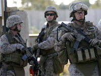 US marines stand guard in Baghdad(Credit: Reuters)