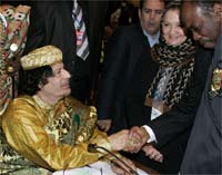 Muammar Gaddafi shakes hands with delegates at the AU summit(Photo: Reuters)