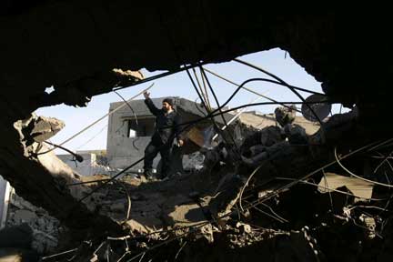 A police officer at a Hamas outpost hit by Israel on Monday (Photo: Reuters)