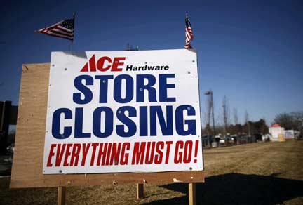 Signs advertising a store closing and sales are seen for the Ace hardware store in Islip, New York (Photo: Reuters)