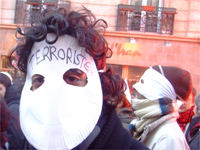A protestor with a face mask.(Photo: Marco Chown Oved)