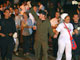 Soldier Giovanni Dominguez (L), police officers Alexis Torres (C) and Walter Lozano (R) greet the crowd upon their arrival in Villavicencio, 1 February 2009(Photo: Reuters)