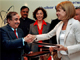 Anne Lauvergeon, CEO of Areva (left) and S.K. Jain, CEO of Nuclear Power Corporation of India.(Photo: AFP)