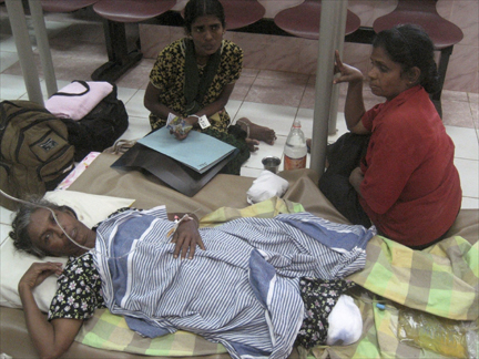 A Tamil woman receiving treatment at a hospital in the eastern port of Trincomalee, east of Colombo.(Photo: Reuters)