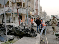 The remains of a bomb attack in Baghdad, 1 March 2009.(Photo: Reuters)