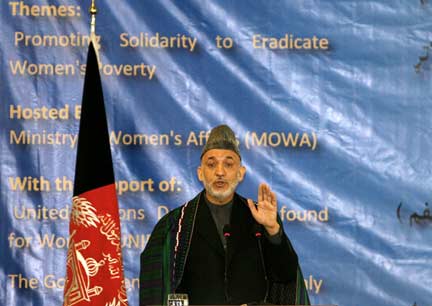 Karzai speaks to a meeting to mark International Women's Day(Photo: Reuters)