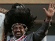 Beshir in traditional southern headdress in Khartoum Saturday(Photo: Reuters)