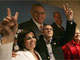 Mauricio Funes (c) claims victory at a news conference, with his wife, Vanda Pignato (l) and running mate Sanchez Ceren (r)(Photo: Reuters)