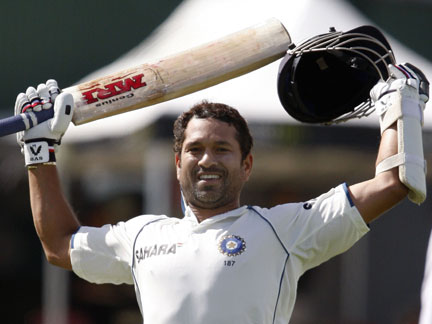 India's Sachin Tendulkar celebrates scoring his 42nd test century on day three during the first test cricket match against New Zealand, in Hamilton, 20 March 
(Photo: Reuters)