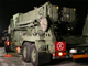 A truck carrying PAC-3 missiles arrives in Asaka, near Tokyo, on 27 March.(Photo: Reuters)