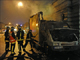 Firefighters put out a truck that was set alight by Tamil protesters in Paris.(Photo: Reuters)