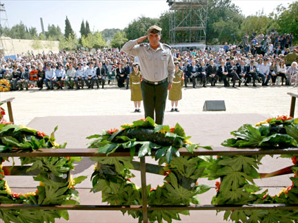 Israel's army chief Lieutenant-General Gabi Ashkenazi salutes during a ceremony marking Holocaust Remembrance Day.(Photo: Reuters)