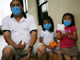 A man and his two daughters wear face masks in Matamoros city on 29 April 2009(Photo: Reuters)