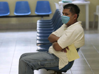 A man wears a mask as he waits at a Health Center in Mexico City on Friday(Photo: Reuters)