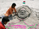 A sand sculpture of Manmohan Singh and a map of India on the banks of the Ganges river in the northern Indian city of Allahabad (Photo: Reuters)