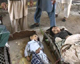 TV footage shows the bodies of two dead children at a makeshift hospital in the town of Mingora, located in the Swat district(Photo: Reuters)