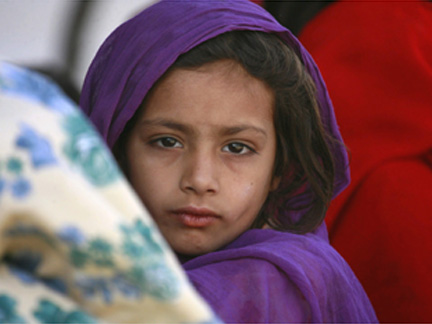 An internally displaced girl, fleeing the military offensive in the Swat valley region, is photographed at a UNHCR camp about 120 km from Islamabad
(Photo: Reuters)