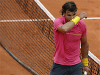 Defending champion Rafael Nadal of Spain reacts after losing to Robin Soderling of Sweden.(Photo: Reuters)