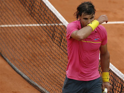 Defending champion Rafael Nadal of Spain reacts after losing to Robin Soderling of Sweden.(Photo: Reuters)