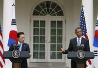 South Korean President Lee Myung-Bak and US counterpart Barack Obama at the White House on June 16, 2009.(Photo: Reuters/Larry Downing)
