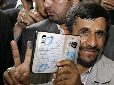 President Mahmoud Ahmadinejad flashing the victory sign after casting his ballot in Tehran on 12 June(Photo: Reuters)