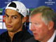 Manchester United's Cristiano Ronaldo (L) is seen looking at manager Alex Ferguson at a press conference(File photo: Reuters)