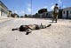 A Somali government soldier lies dead in the street after renewed fighting in Yaqshid district of Mogadishu, 1 June 2009(Photo:Reuters/Mowdli Abid)