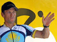 Astana rider Lance Armstrong arrives at the sign-in podium before the start of the second stage of the 96th Tour de France(Photo: Reuters)