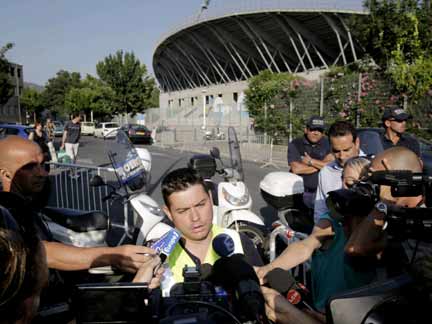 French fire brigade press officer Thierry Delorme (C) speaks outside the Velodrome stadium in Marseille after the accident(Photo: Reuters)