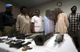 Police in Karachi show off weapons and alleged Taliban seized during a raid in the city on Sunday(Photo: Reuters)