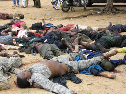 The bodies of Nigerians are brought to a police station in the northeastern city of Bauchi after clashes between security forces and armed groups on 26 July, 2009(Photo : Reuters/Ardo Hazzad)