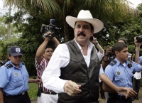 Deposed Honduras president Manuel Zelaya leaving the Nicaraguan capital Managua.(Photo: Reuters)