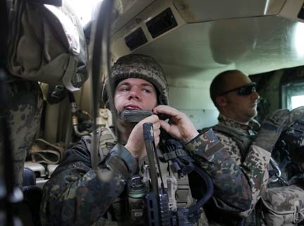 A German soldier with Isaf in an armoured personnel carrier in Afghanistan, 26 August, 2009. 

(Photo:Reuters/Ruben Sprich) 