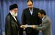 Iranian President Mahmoud Ahmadinejad (R) receives a certificate declaring him as President of the Islamic Republic of Iran from Supreme Leader Ayatollah Ali Khamenei (L) in Tehran,  3 August , 2009. 